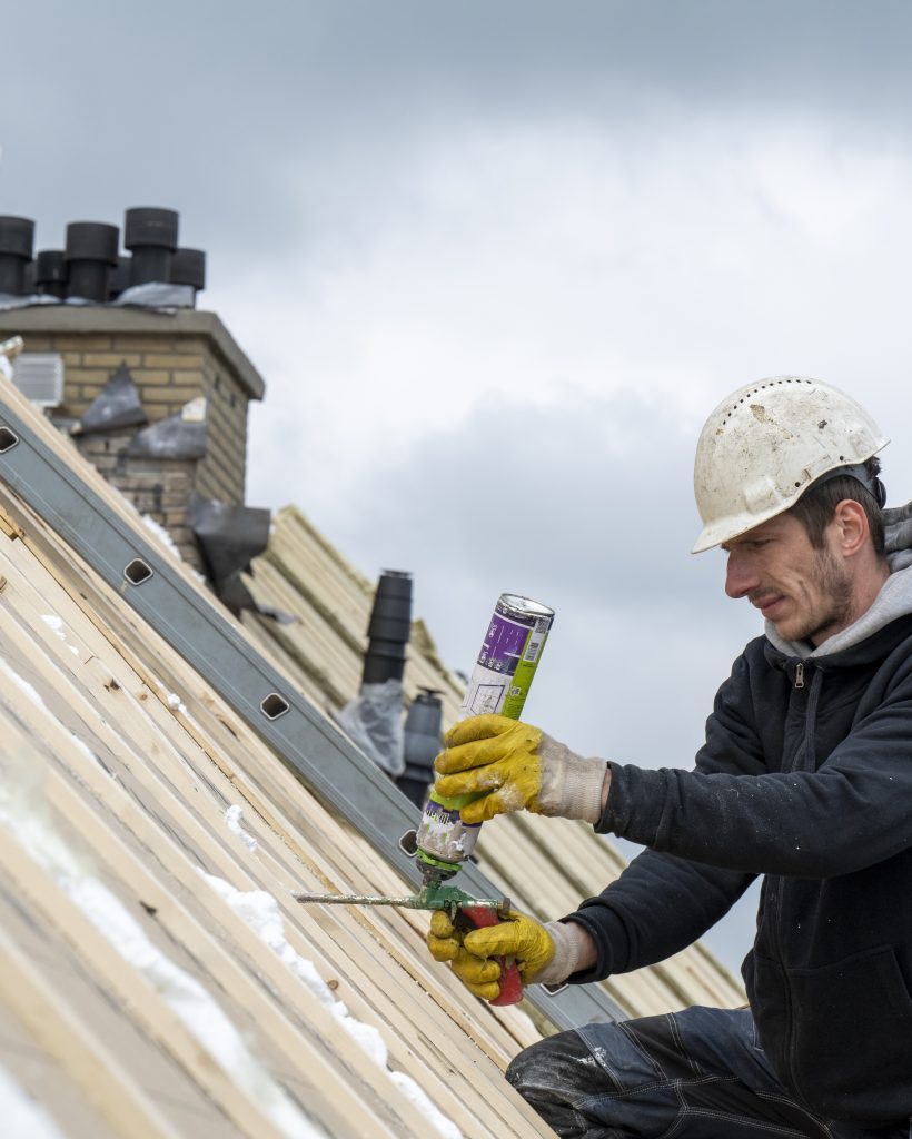 Roofing team working at height